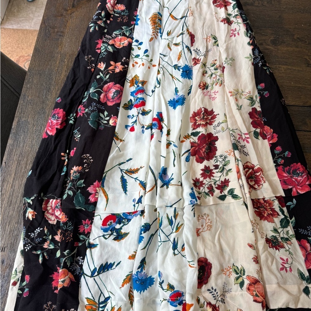Maje Revolve nwt size 2
Jinger Floral Midi Skirt 
Floral Patchwork Midi Skirt - Picture 3 of 4